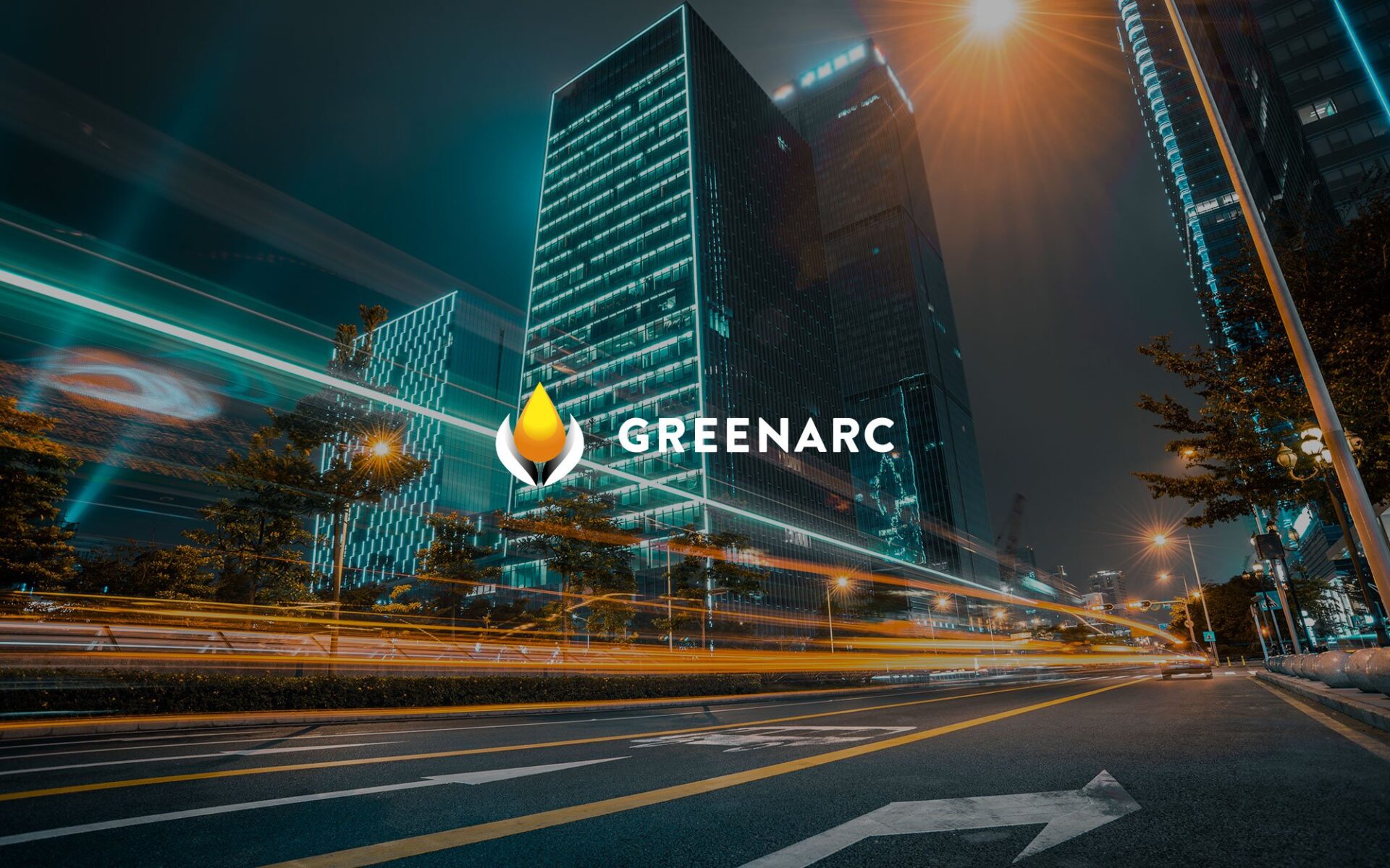 A cityscape at night with blurred vehicle lights and buildings, showcasing the GreenArc logo prominently against the skyline.